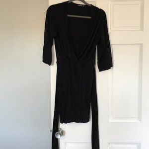 Black fitted v-neck wrap dress
